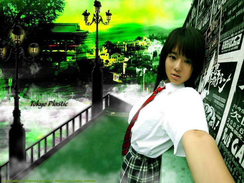 Girl in school uniform on bridge