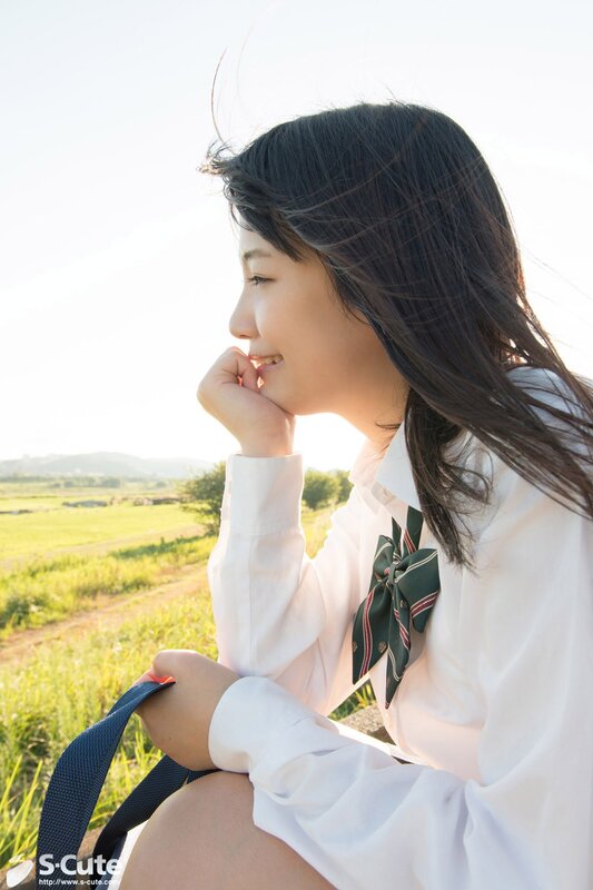 Girl in school uniform outdoors