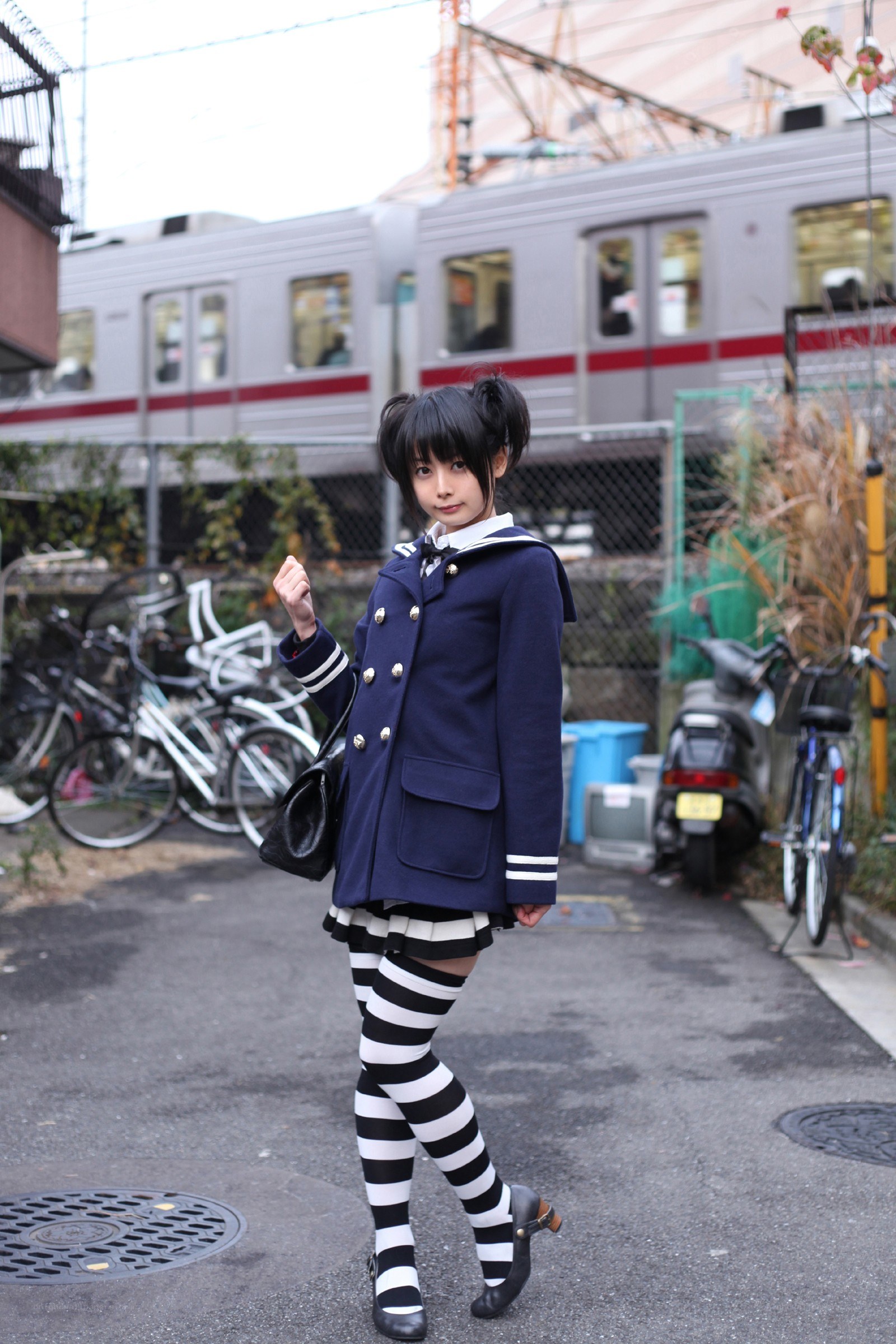 girl in school uniform posing