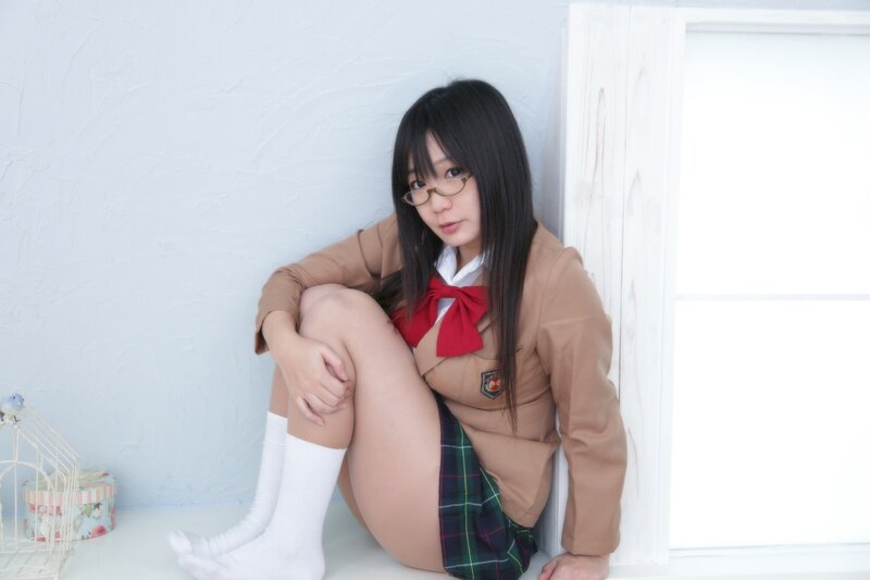 girl in school uniform sitting