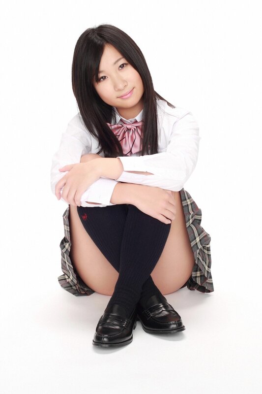 girl in school uniform sitting