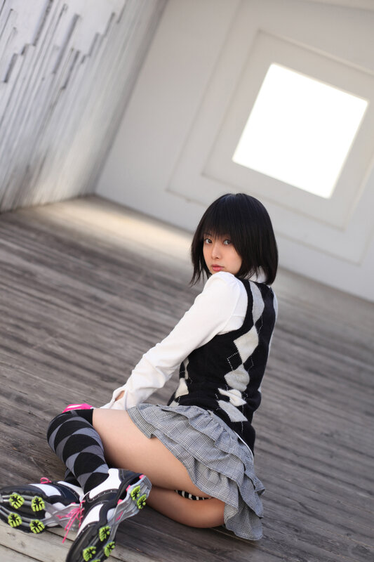 girl in school uniform sitting