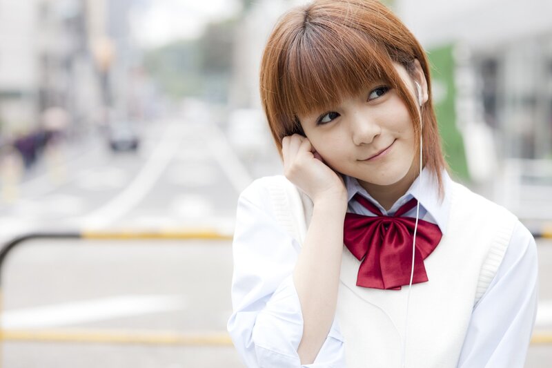 girl in school uniform smiling