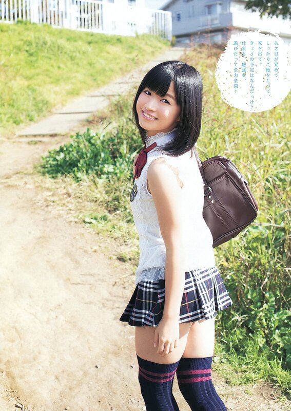 Girl in school uniform smiling