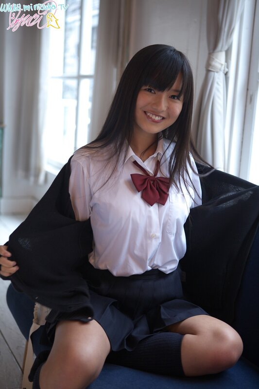 girl in school uniform smiling
