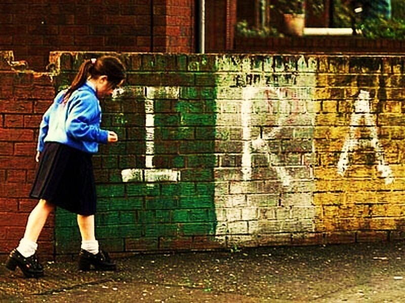 Girl in school uniform walking