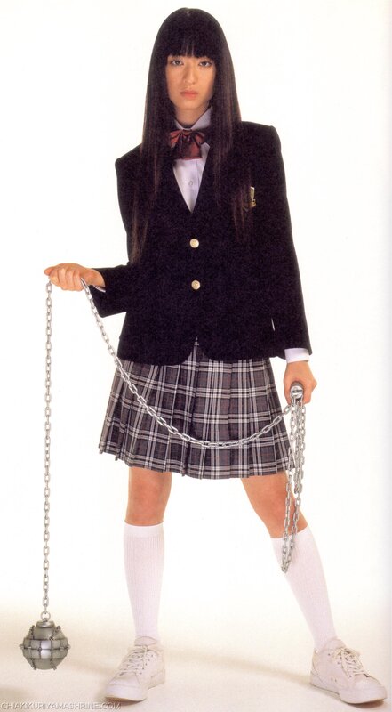 Girl in school uniform with chain weapon