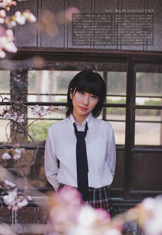 girl in school uniform with cherry blossoms