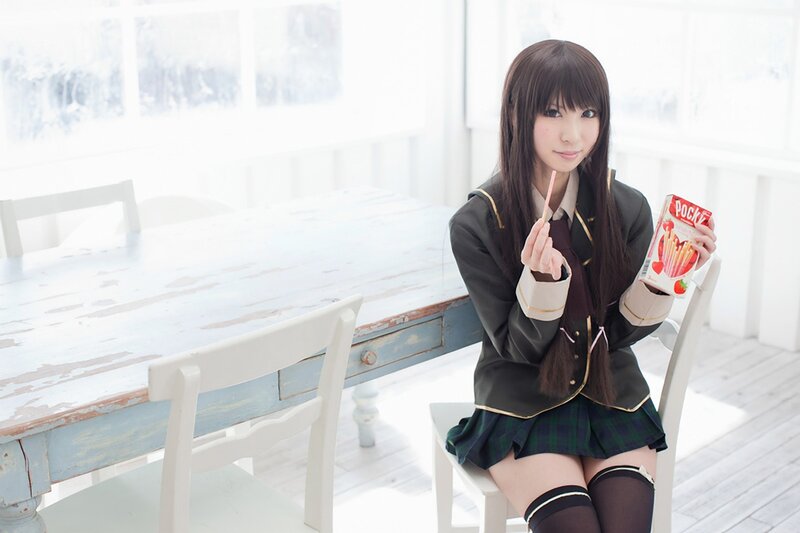 girl in school uniform with snacks