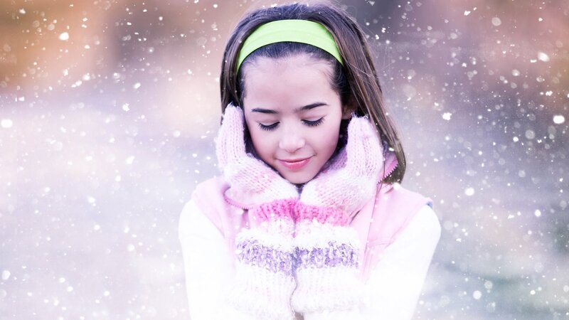 girl in snow with scarf