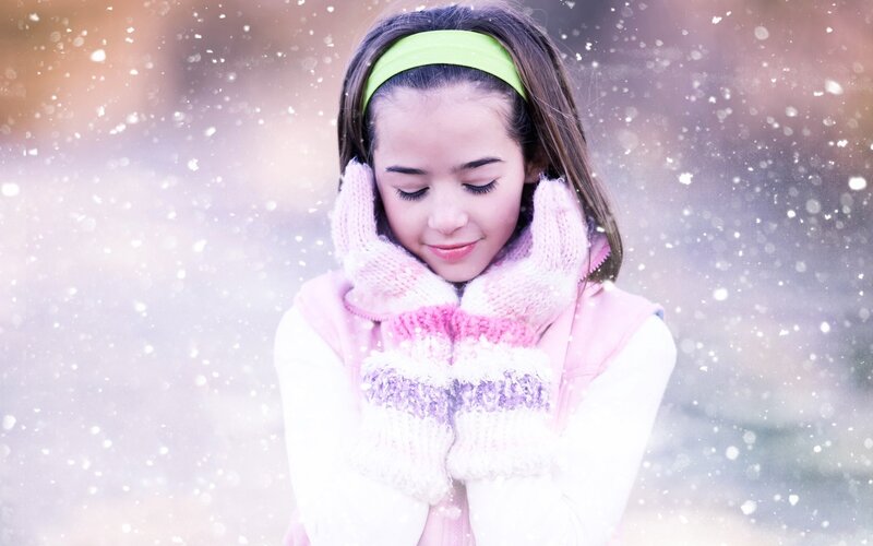 girl in snow with scarf