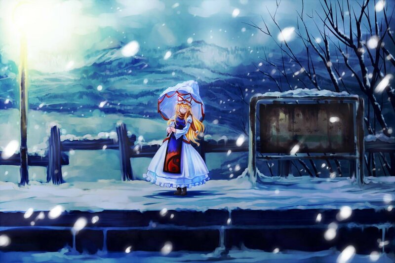 Girl in snow with umbrella
