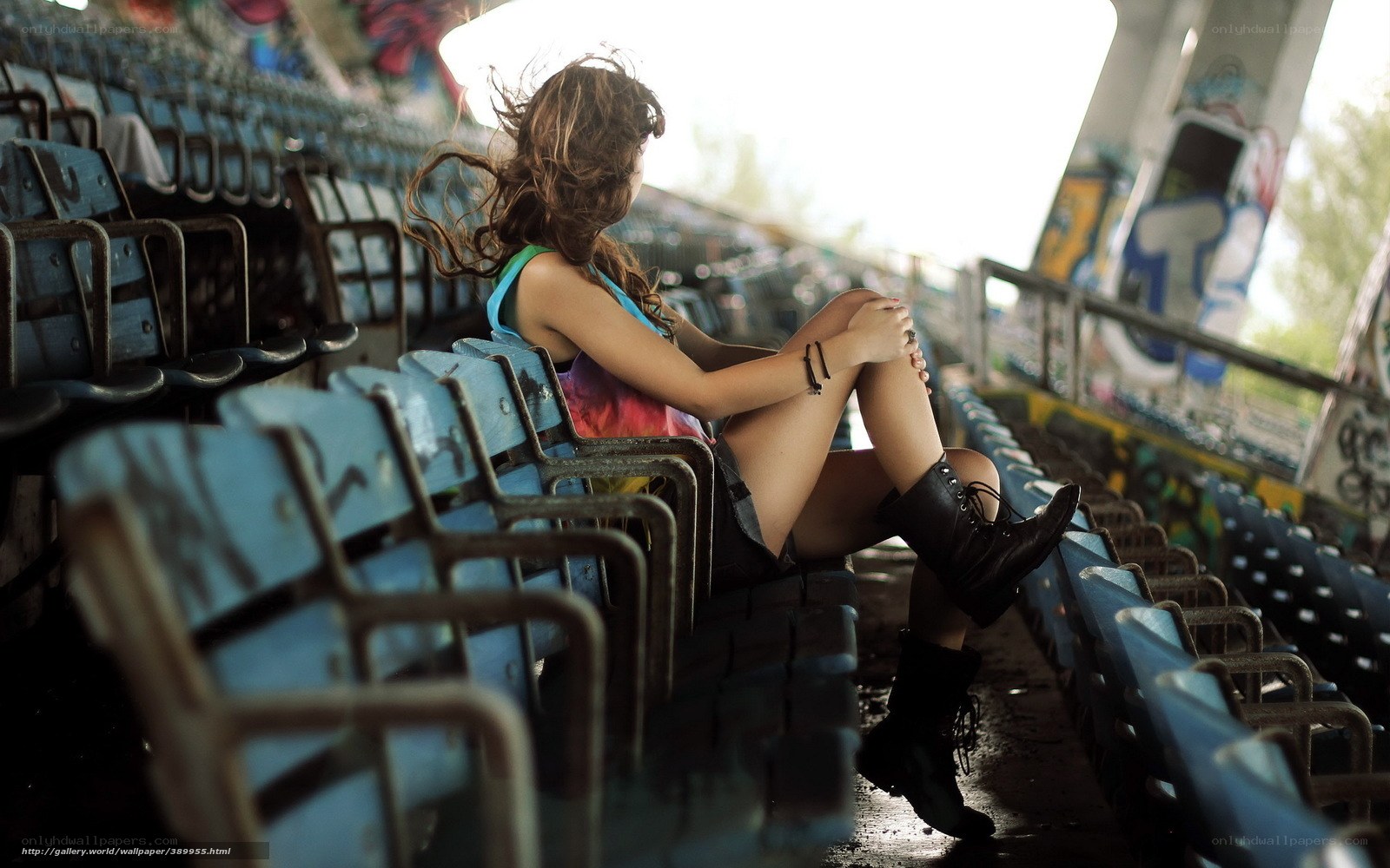 Girl in stadium seats