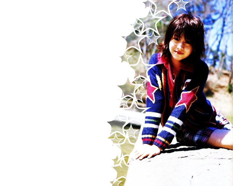 girl in star sweater outdoors