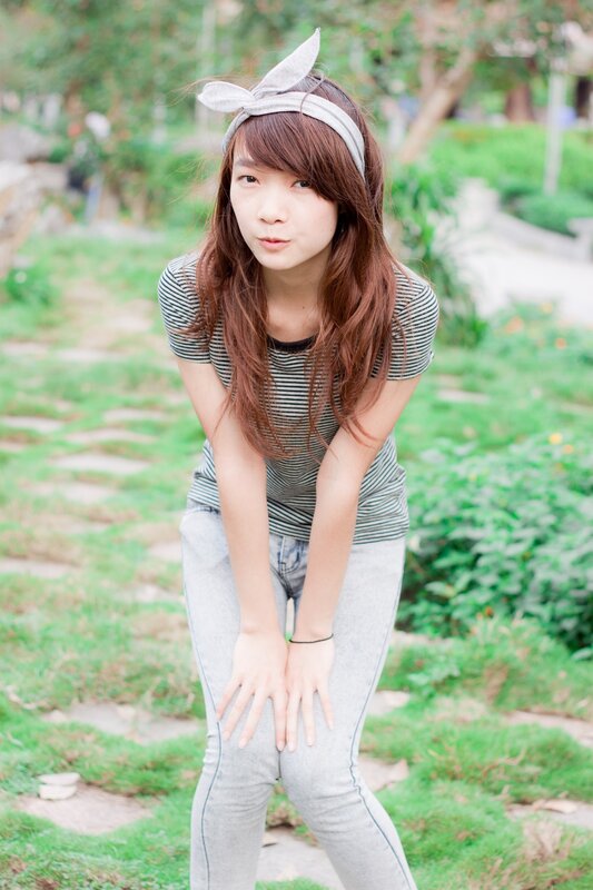 Girl in striped shirt outdoors