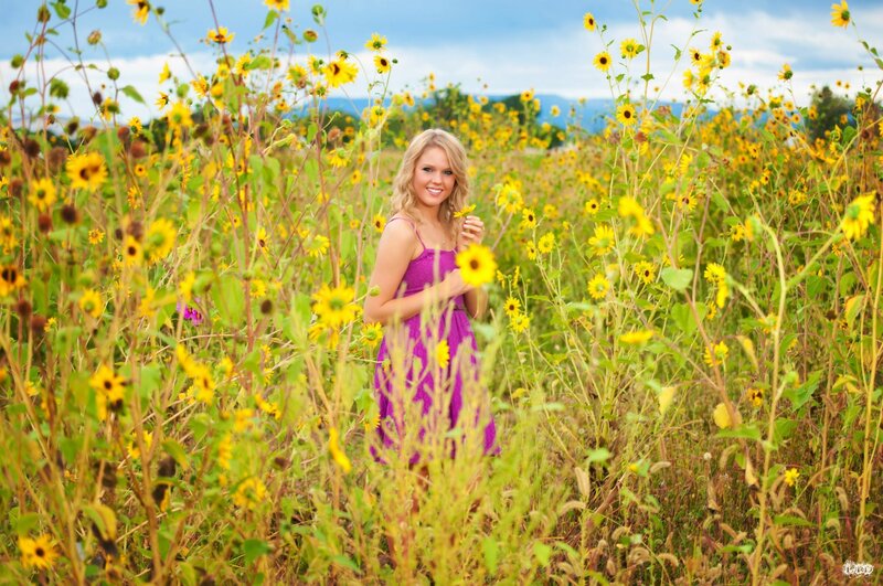 Girl in sunflower field