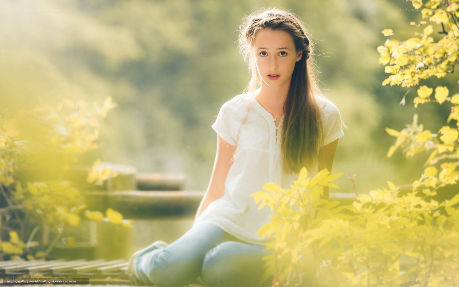 Girl in sunlit garden