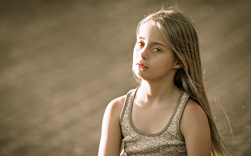 girl in sunlit tank top