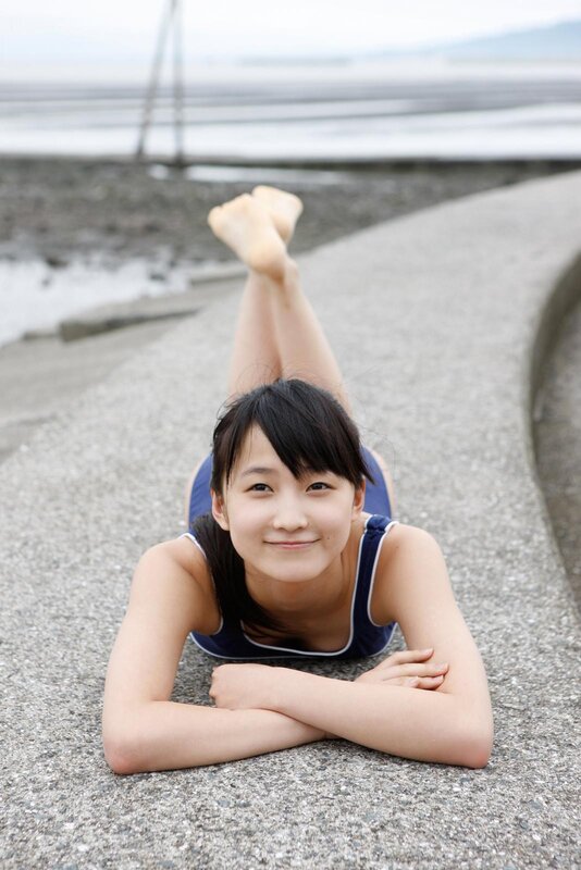 girl in swimsuit on beach