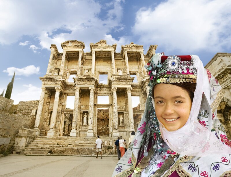 Girl in traditional dress at ancient ruins