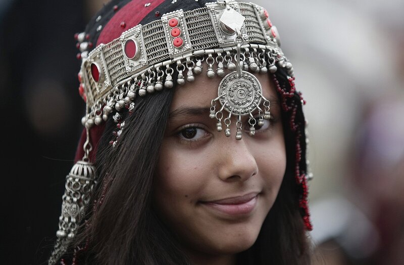 girl in traditional headpiece