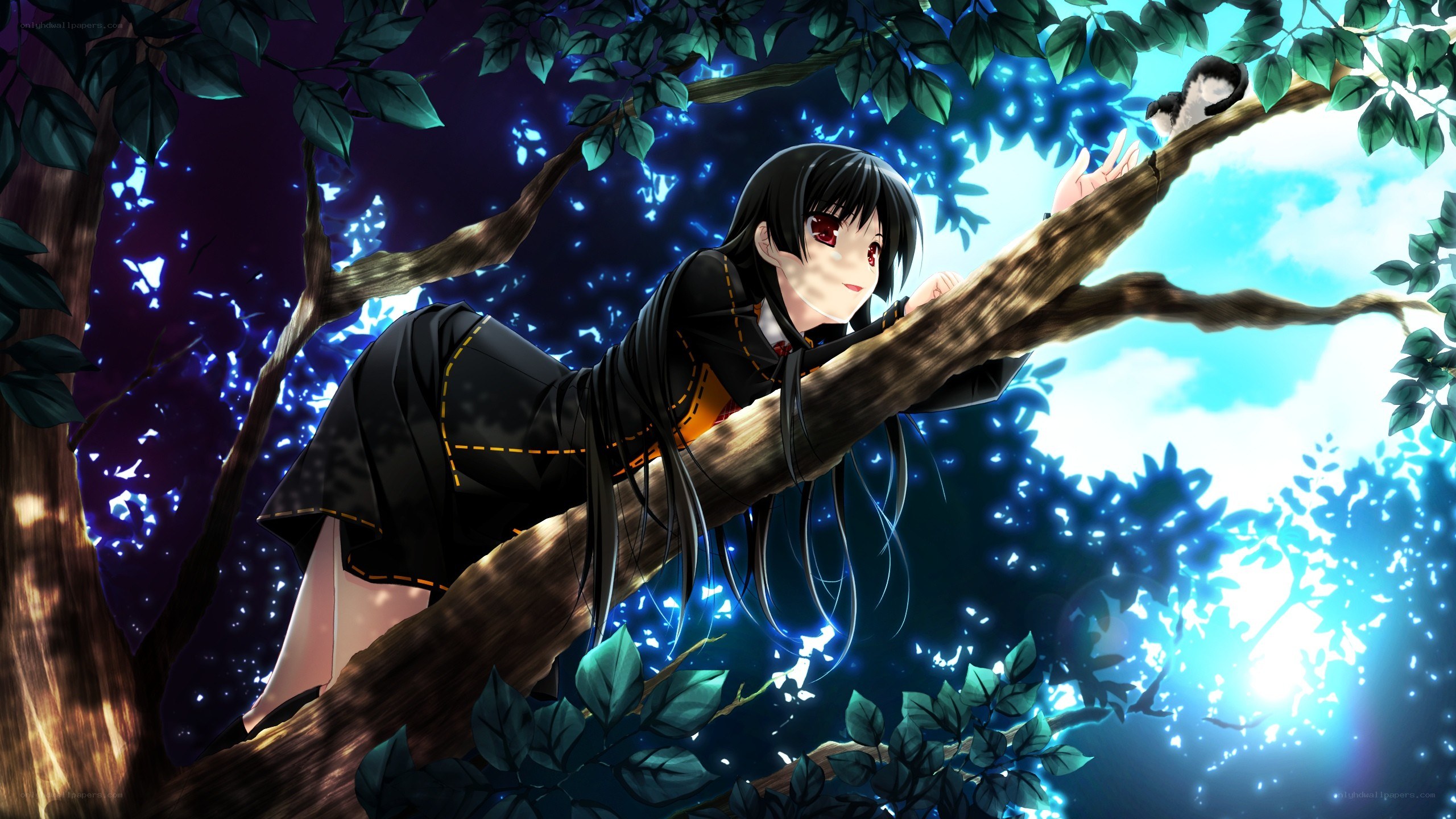 girl in tree with glowing lights