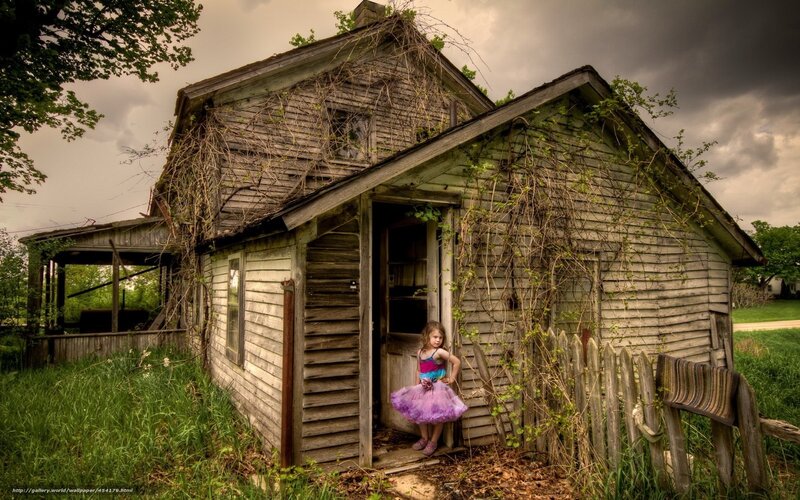 girl in tutu at old house