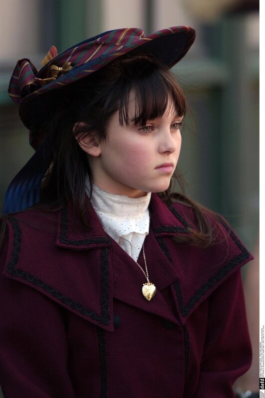 girl in vintage coat and hat