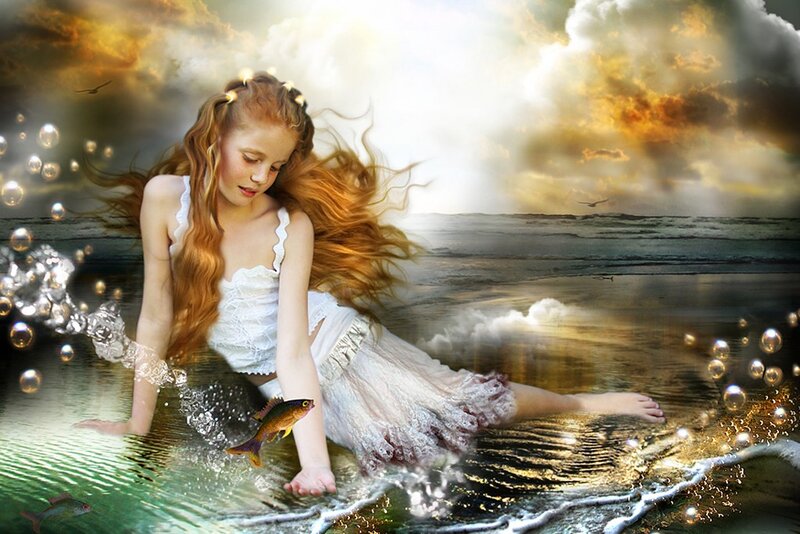 girl in water with fish