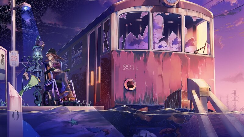 Girl in wheelchair by a train