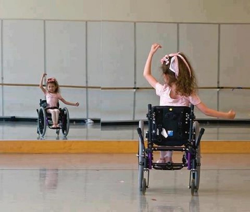 Girl in Wheelchair Dancing