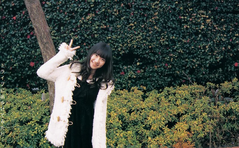 Girl in white coat outdoors