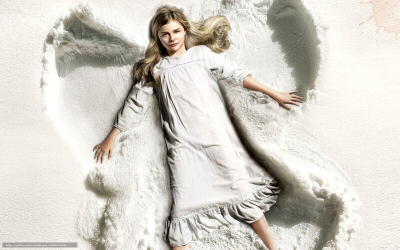 girl in white dress on snow