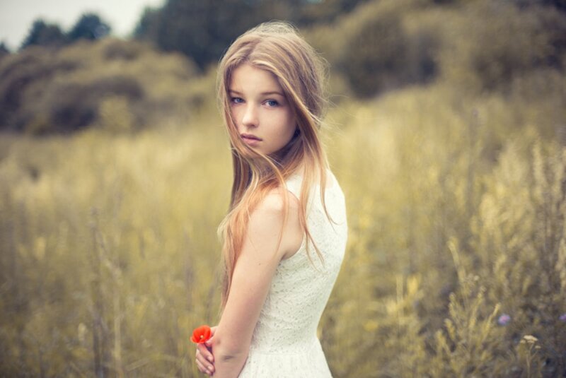 Girl in White Dress — Serene, Afternoon, Photograph, Red Flower