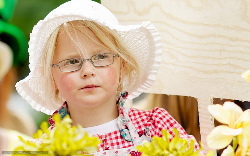 girl in white hat and glasses