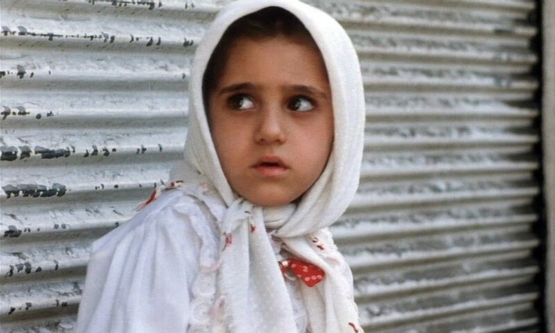 girl in white headscarf