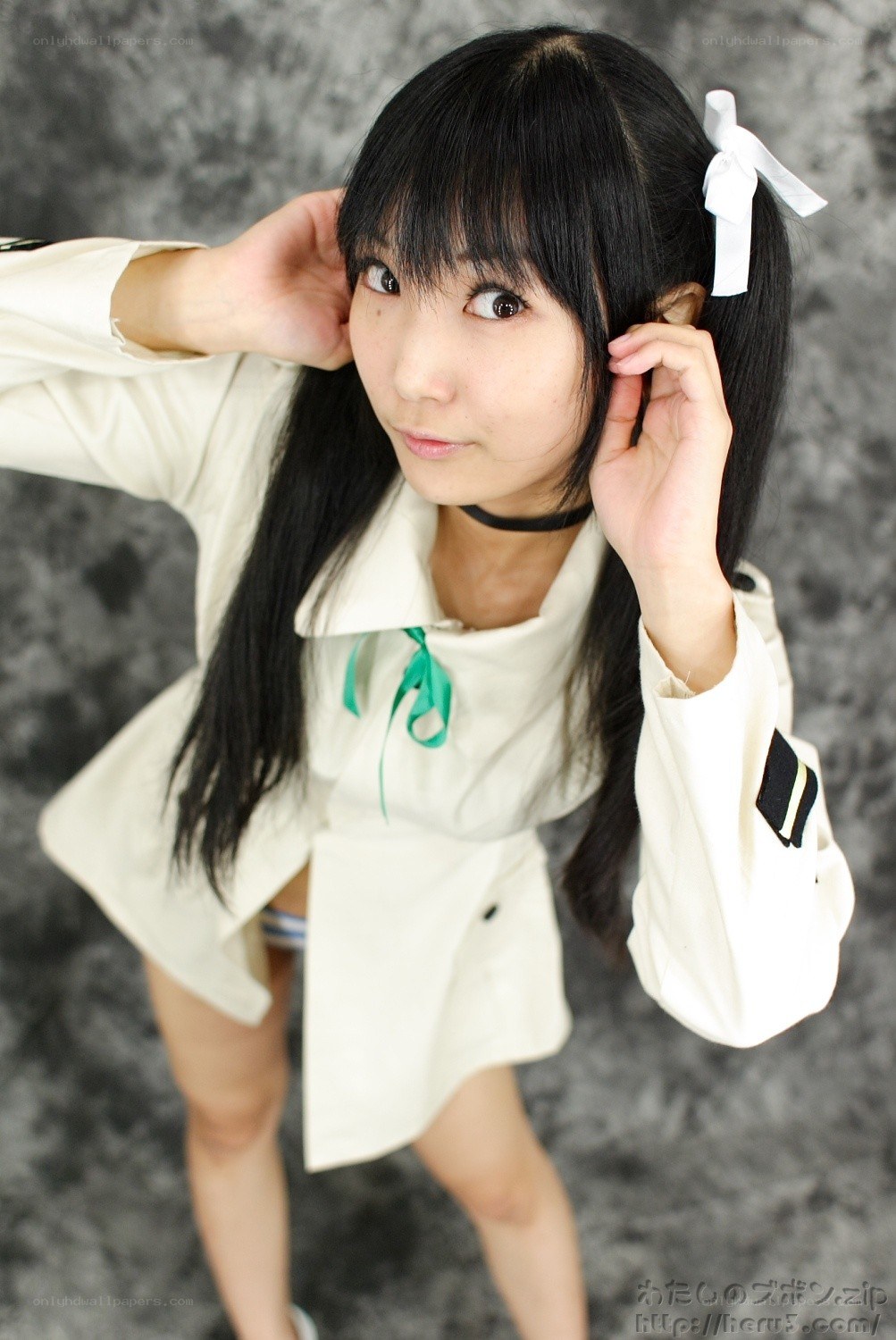girl in white outfit posing