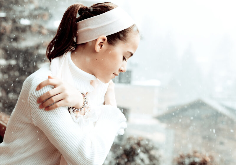 Girl in White Sweater