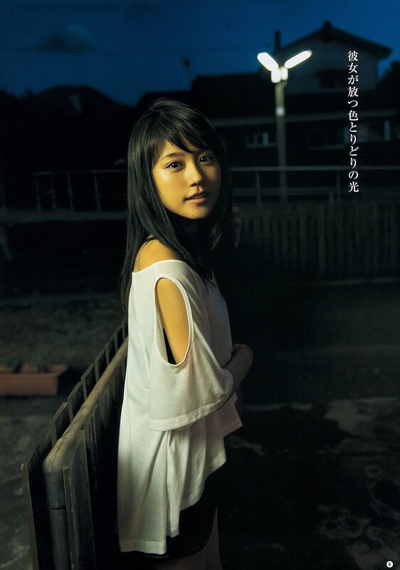 Girl in white top at night