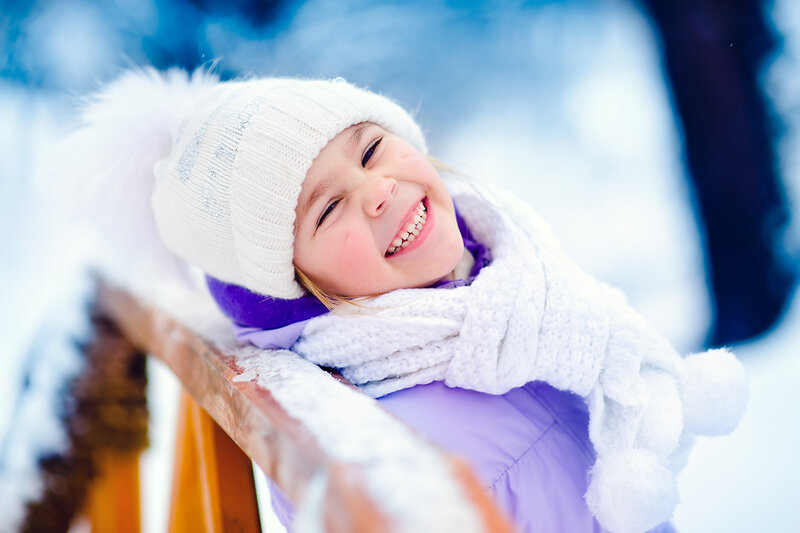 Girl in Winter Clothes — White, Joyful