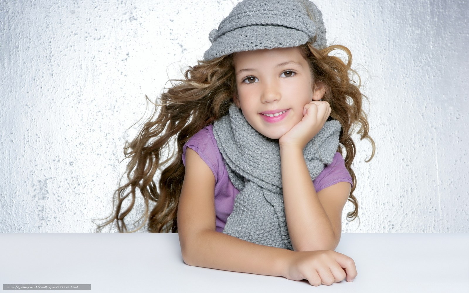 girl in winter hat and scarf
