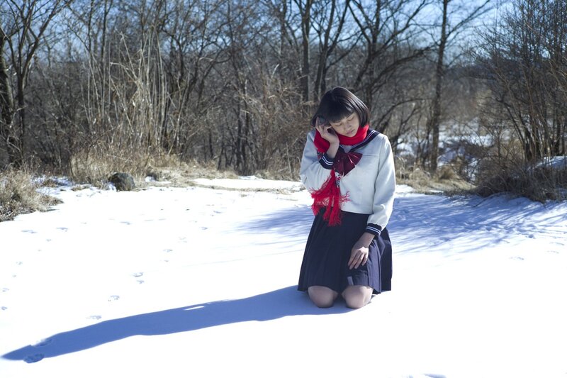 Girl in winter school uniform