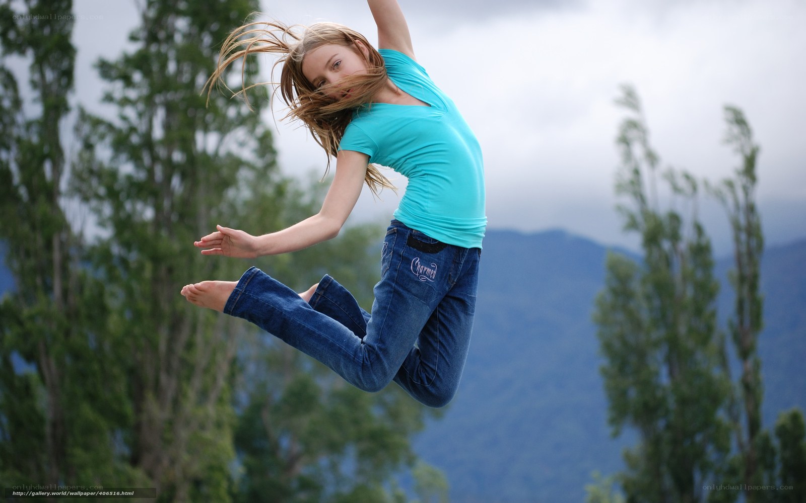 Girl jumping in nature