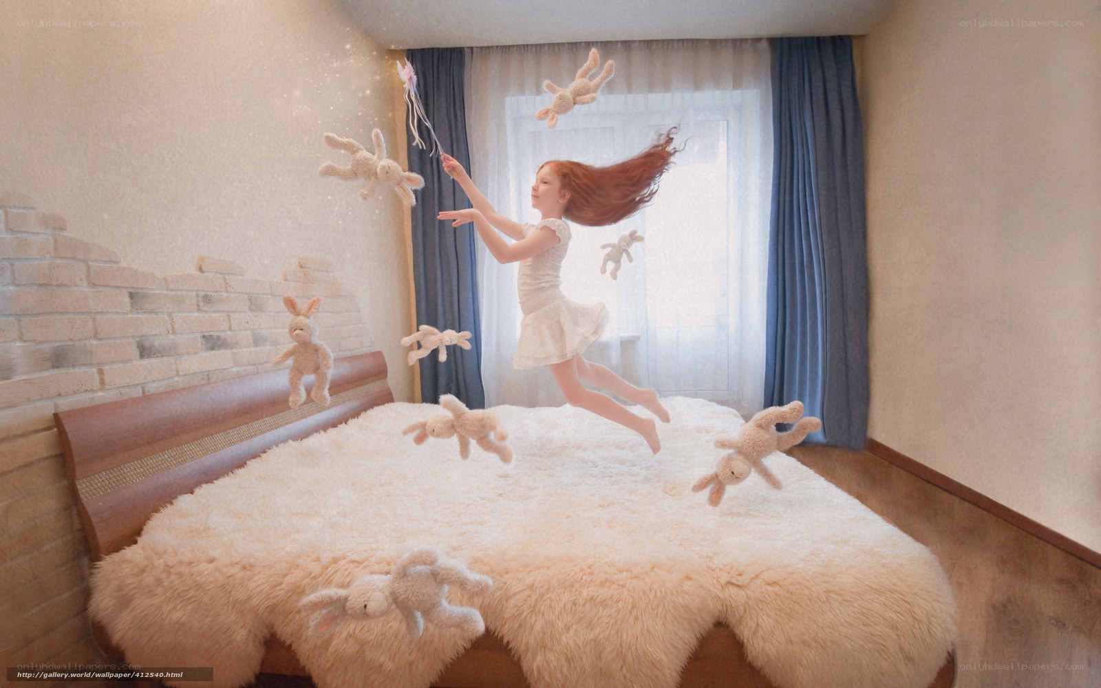 Girl jumping on a bed with stuffed animals