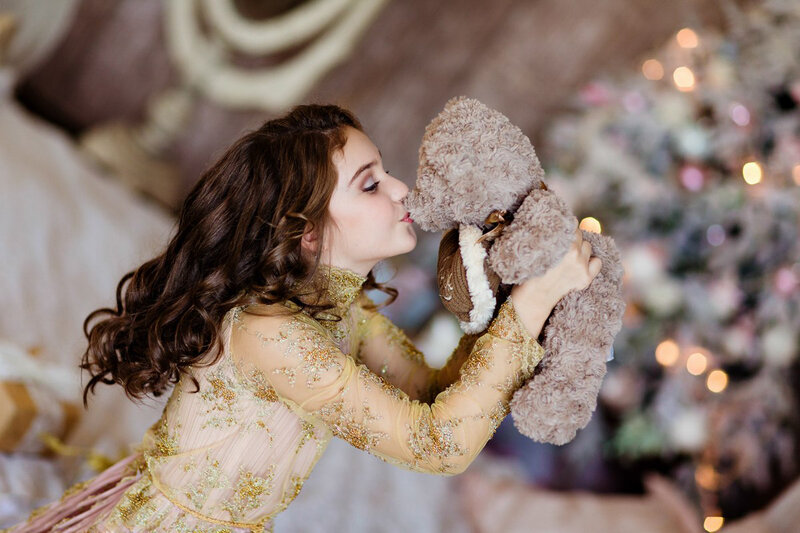 Girl Kissing Teddy Bear