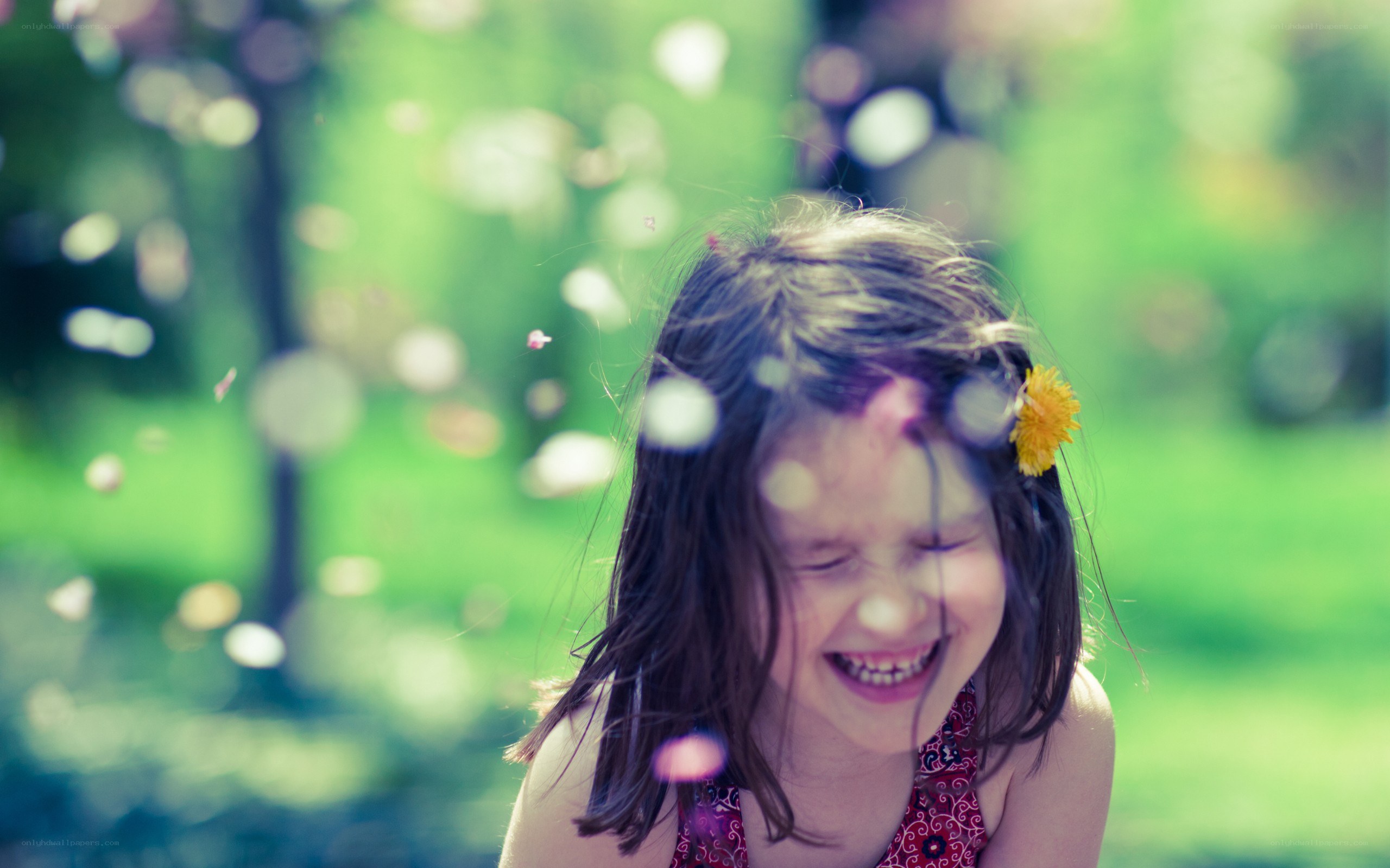 girl laughing in park