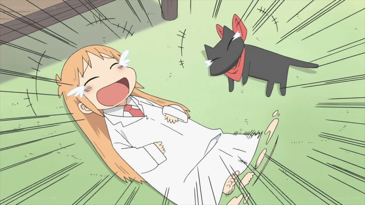 girl laughing with cat