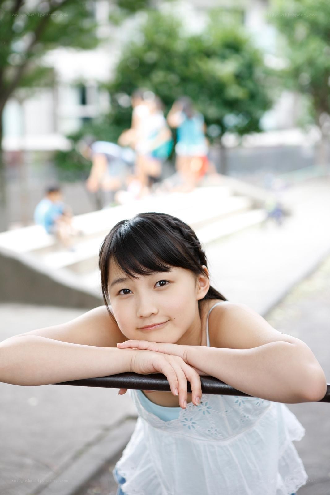 girl leaning on railing