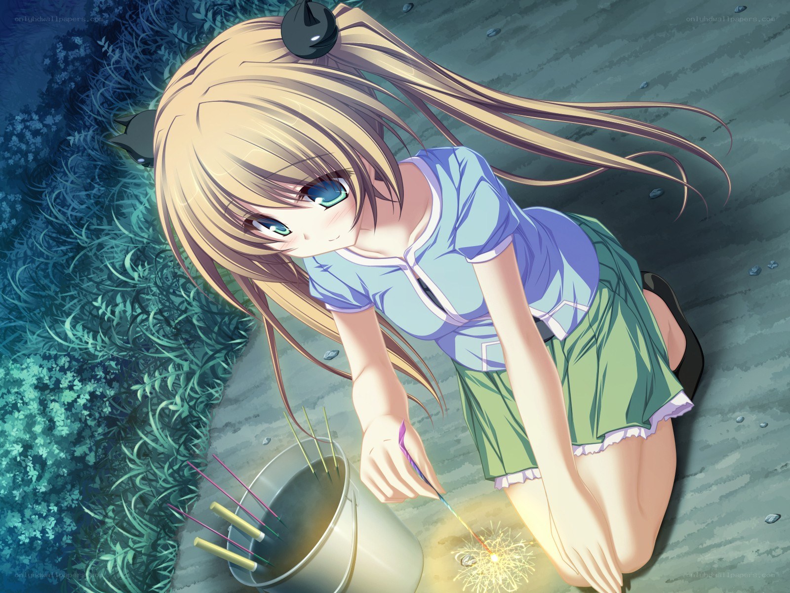 girl lighting sparklers