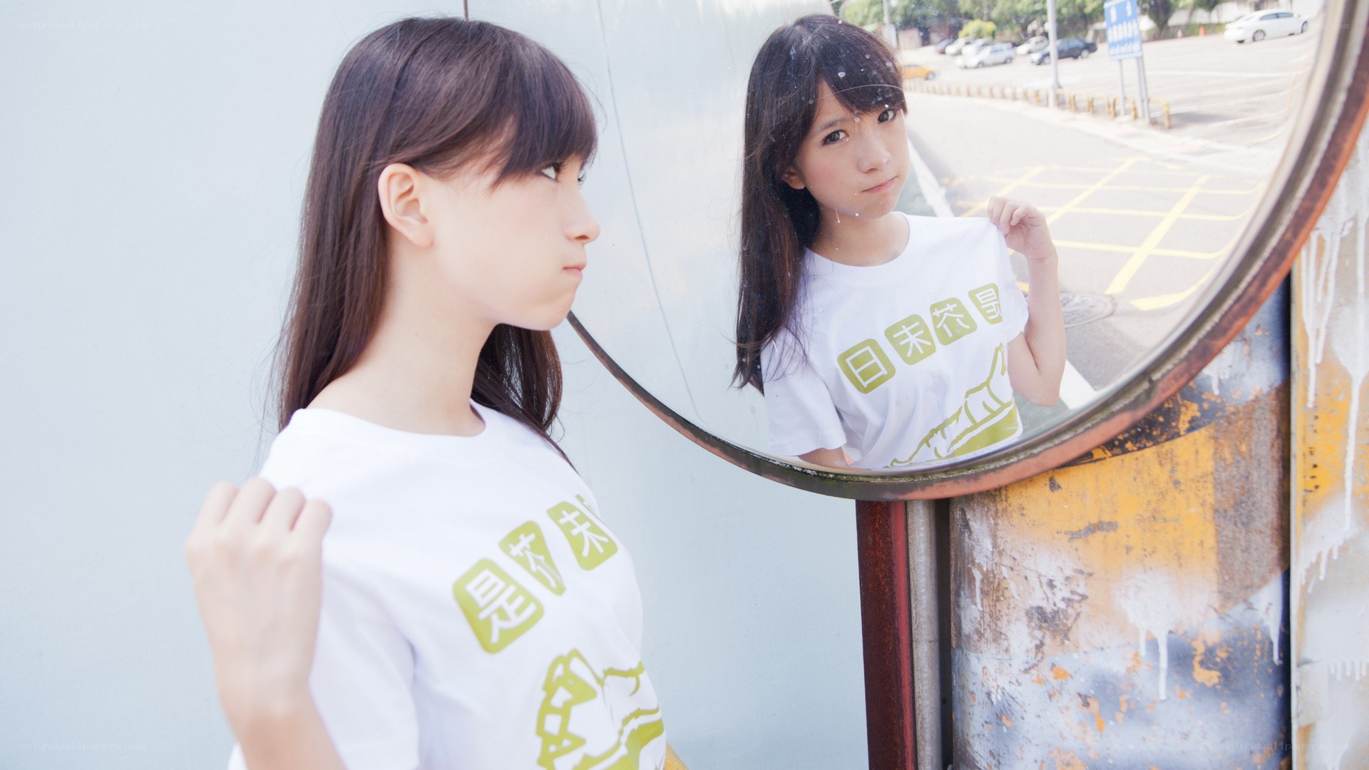 girl looking at her reflection